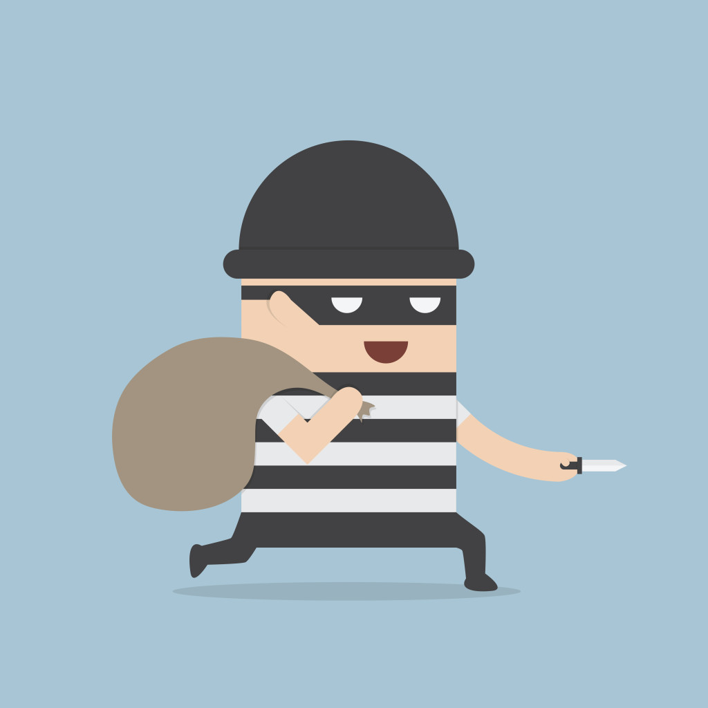 Thief cartoon holding knife in his hand and carrying a money bag
